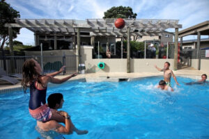 Kids playing in the swimming pool
